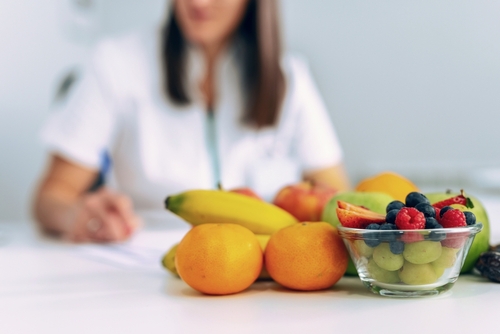 Shot,Of,Beautiful,Smart,Nutritionist,Woman,Working,With,Computer,While